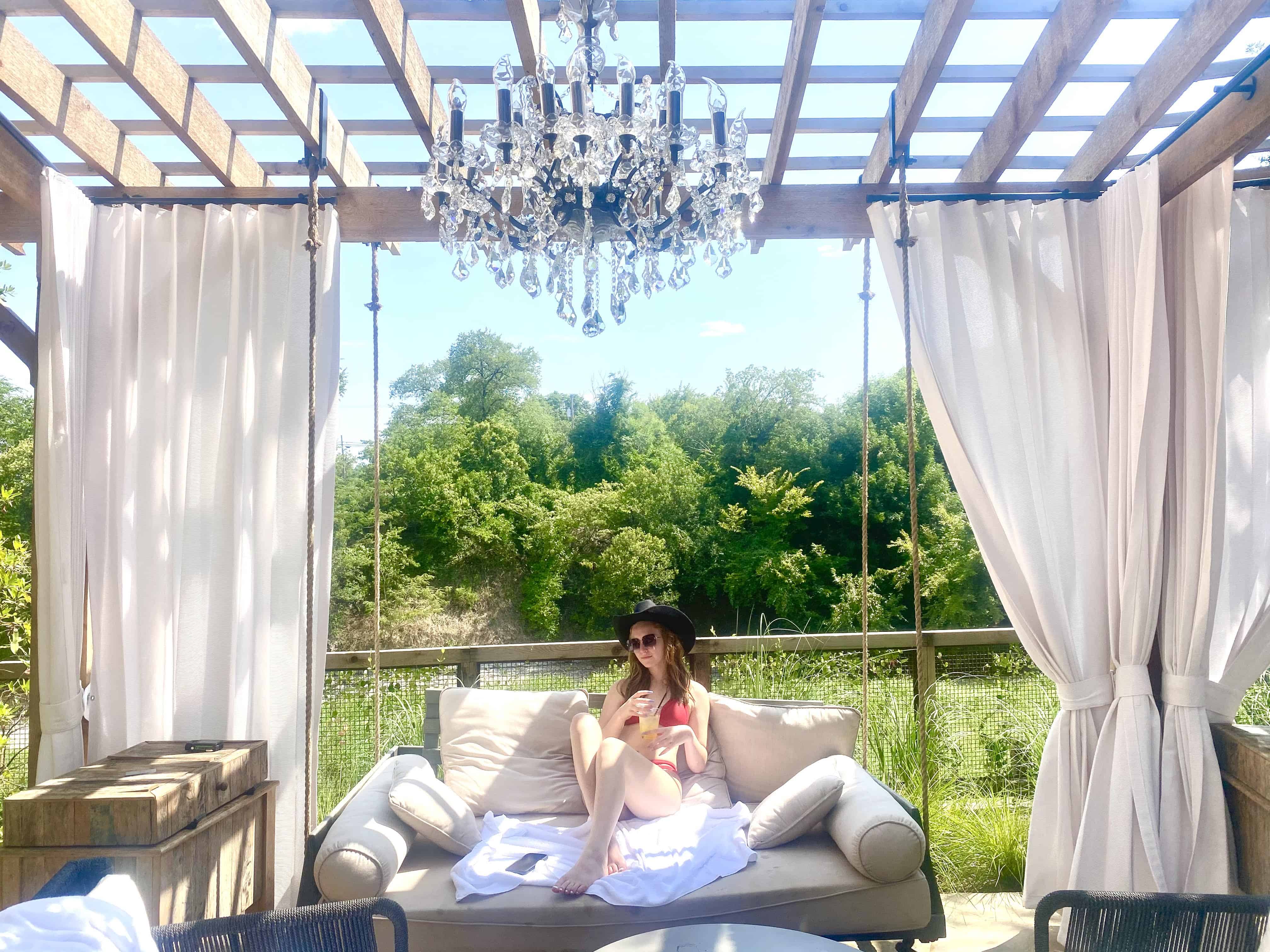 The crystal chandeliers dangle at the cabana the Drover pool 