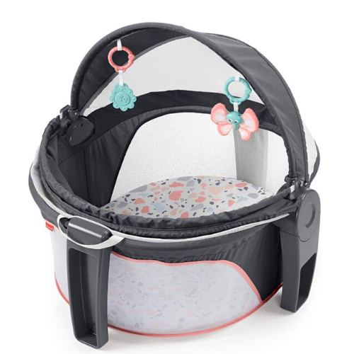 The Fischer Price Travel Dome is one of the best essentials for traveling with a baby. Its fantastic for indoor and outdoor use. 