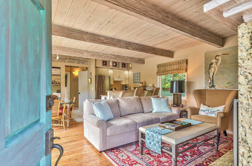 Cozy living room at Atherton Cottage with fireplace and comfortable seating