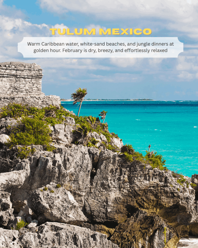 Overwater villas in the Maldives above crystal-clear lagoon water with blue skies and calm seas during peak dry season in February.